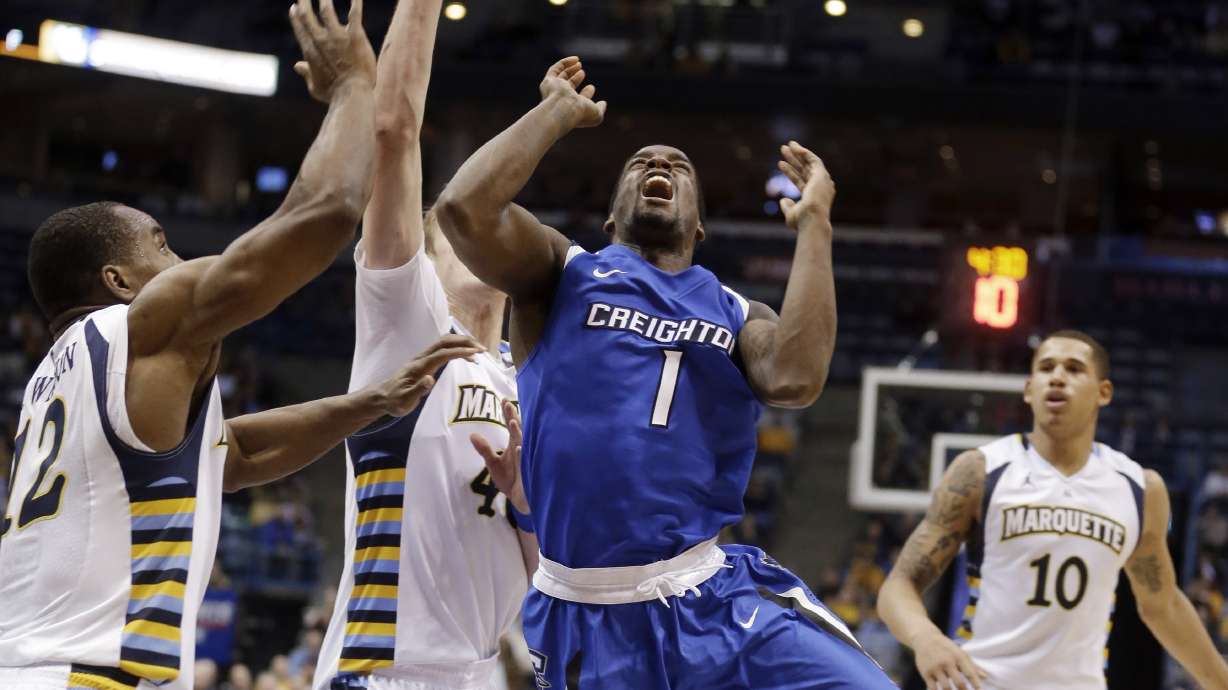 Carlino's 3 helps Marquette beat Creighton 53-52