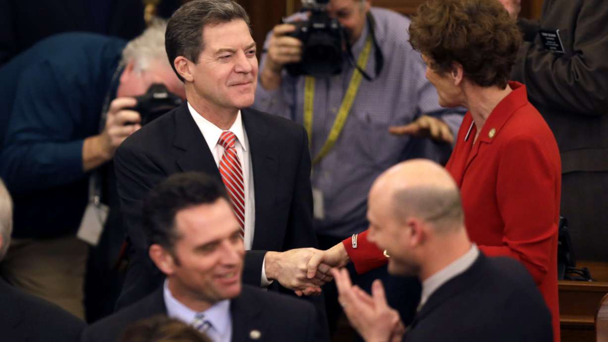 Governor says Kansas will continue moving to no income tax