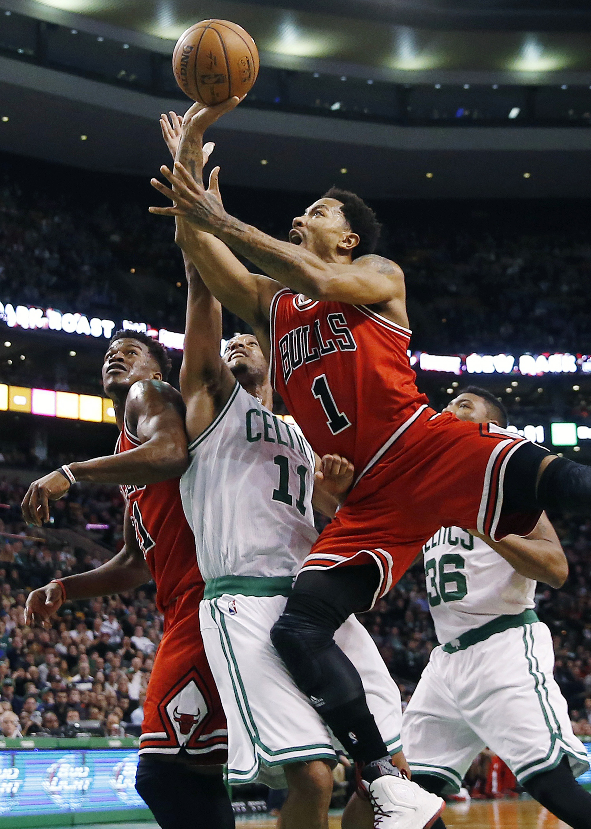 Rose's double-double leads Bulls over Celtics 119-103