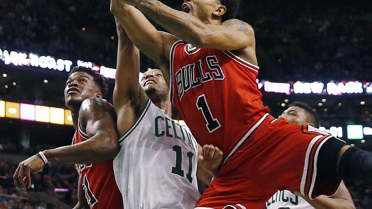 Rose's double-double leads Bulls over Celtics 119-103