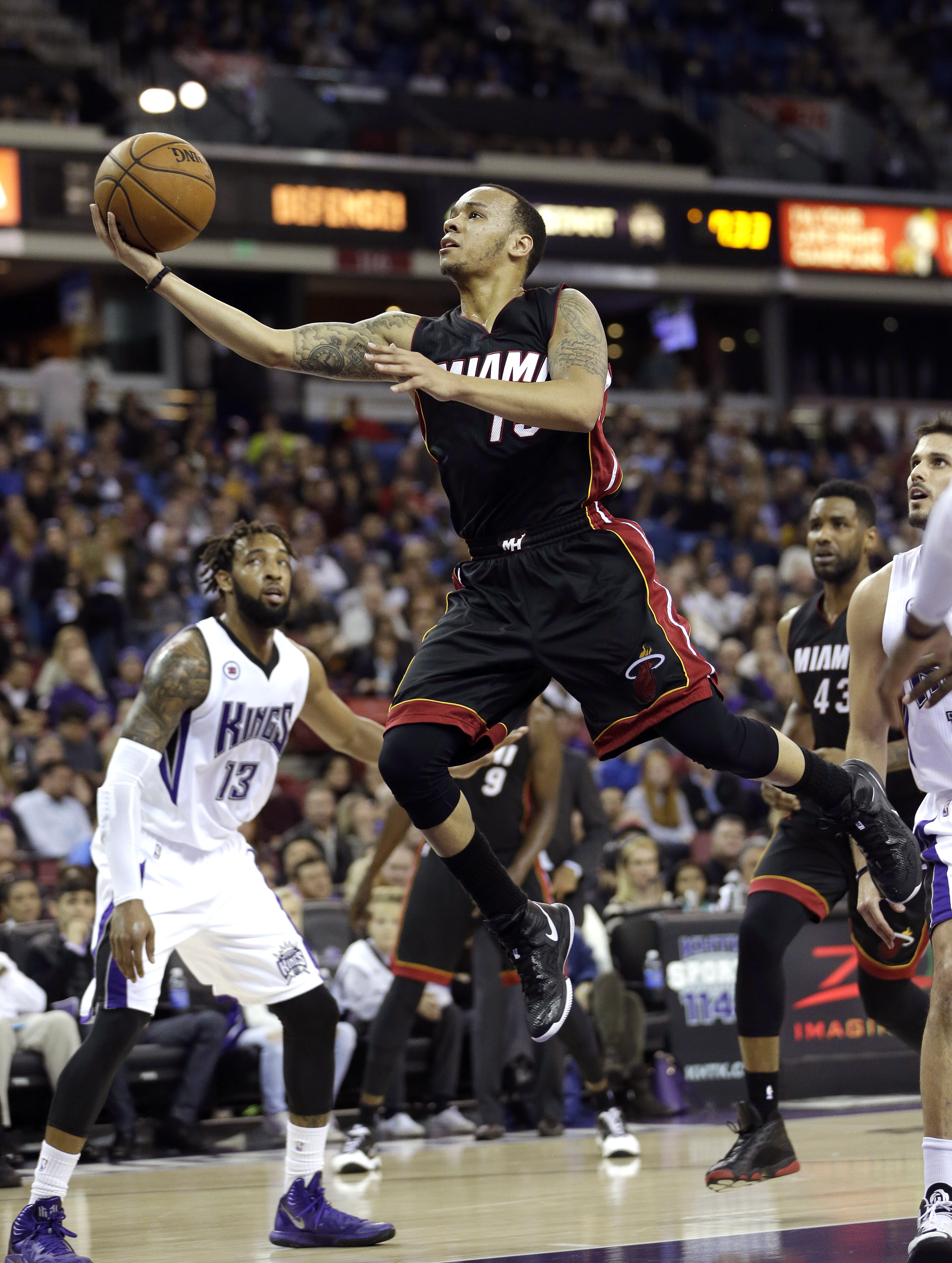 Bosh, Deng lead Heat to 95-83 win over Sacramento