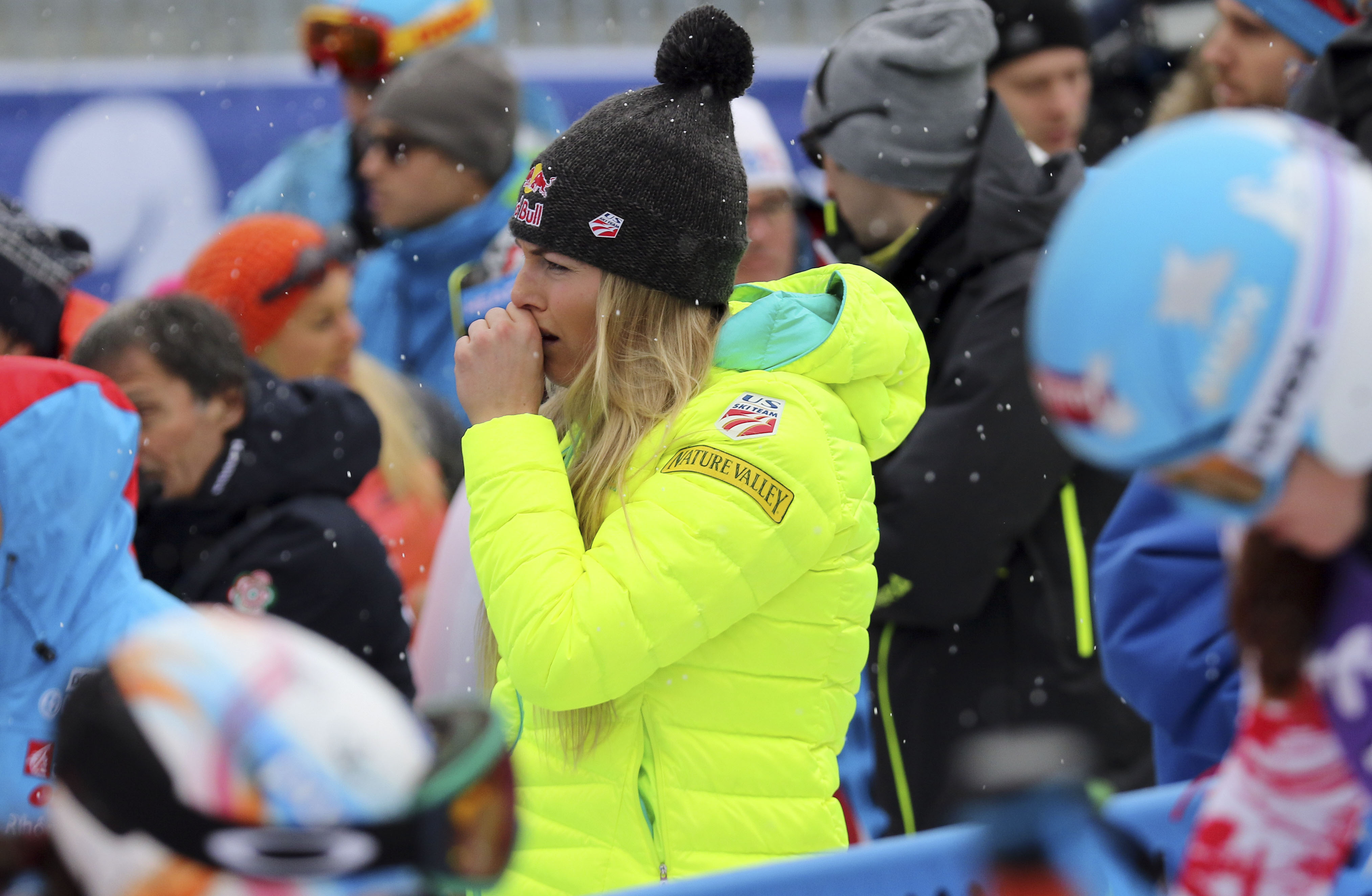 Cortina downhill postponed; Vonn record wait extended