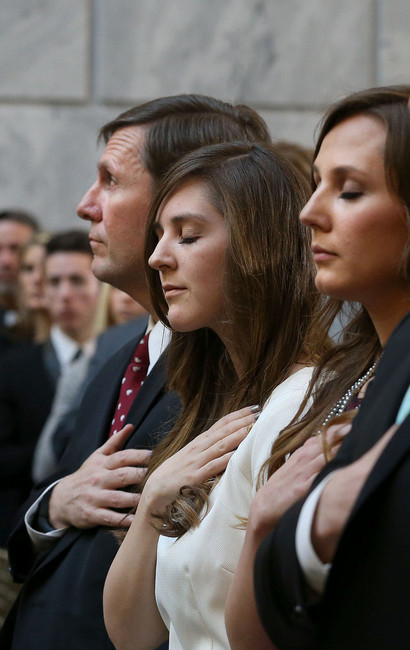 "My mom understood the best way to teach her children how to love their state and love their country was to involve us." -Emily Britton (Photo: Stan Lockhart, husband of former Speaker of the House Rebecca Lockhart, and daughters Hannah Lockhart and Emily Britton attend the memorial service for former Speaker of the House Rebecca Lockhart. Laura Seitz/Deseret News)
