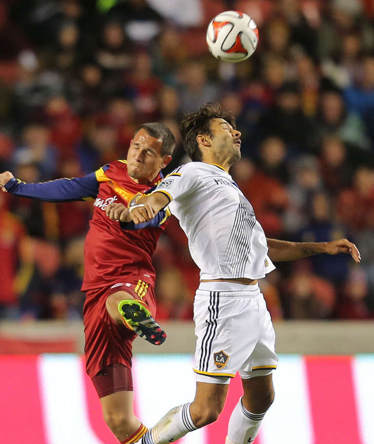 RSL's Luis Gil battles for the ball with Baggio Husidic as Real Salt Lake and the Los Angeles Galaxy play Saturday, Nov. 1, 2014, at Rio Tinto Stadium in Sandy. (Scott G Winterton/Deseret News)