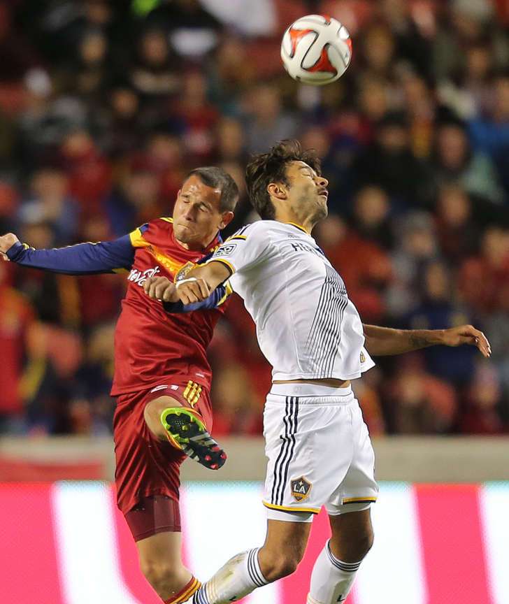 RSL's Luis Gil battles for the ball with Baggio Husidic as Real Salt Lake and the Los Angeles Galaxy play Saturday, Nov. 1, 2014, at Rio Tinto Stadium in Sandy. (Scott G Winterton/Deseret News)