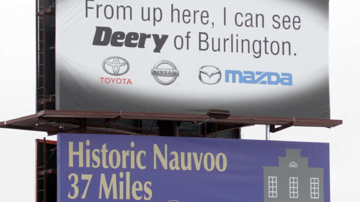 Mannequin on billboard spurs 911 calls about possible jumper