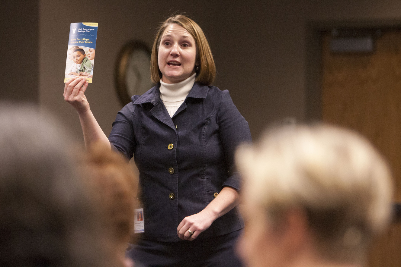 Kaye Poulton-Timm talks to parents about savings plans for their kids' college funds. Parents in the Granite School District gather Saturday, Jan. 24, 2015, for the inaugural Parent Leadership and Empowerment conference held at the district offices in Salt Lake City. (Photo: Scott G Winterton, Deseret News)