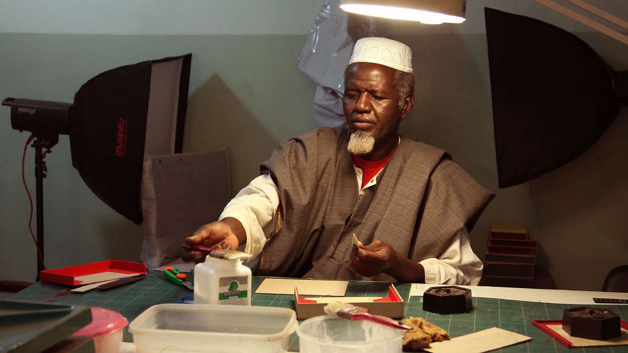 Saved Mali manuscripts face damage in new home