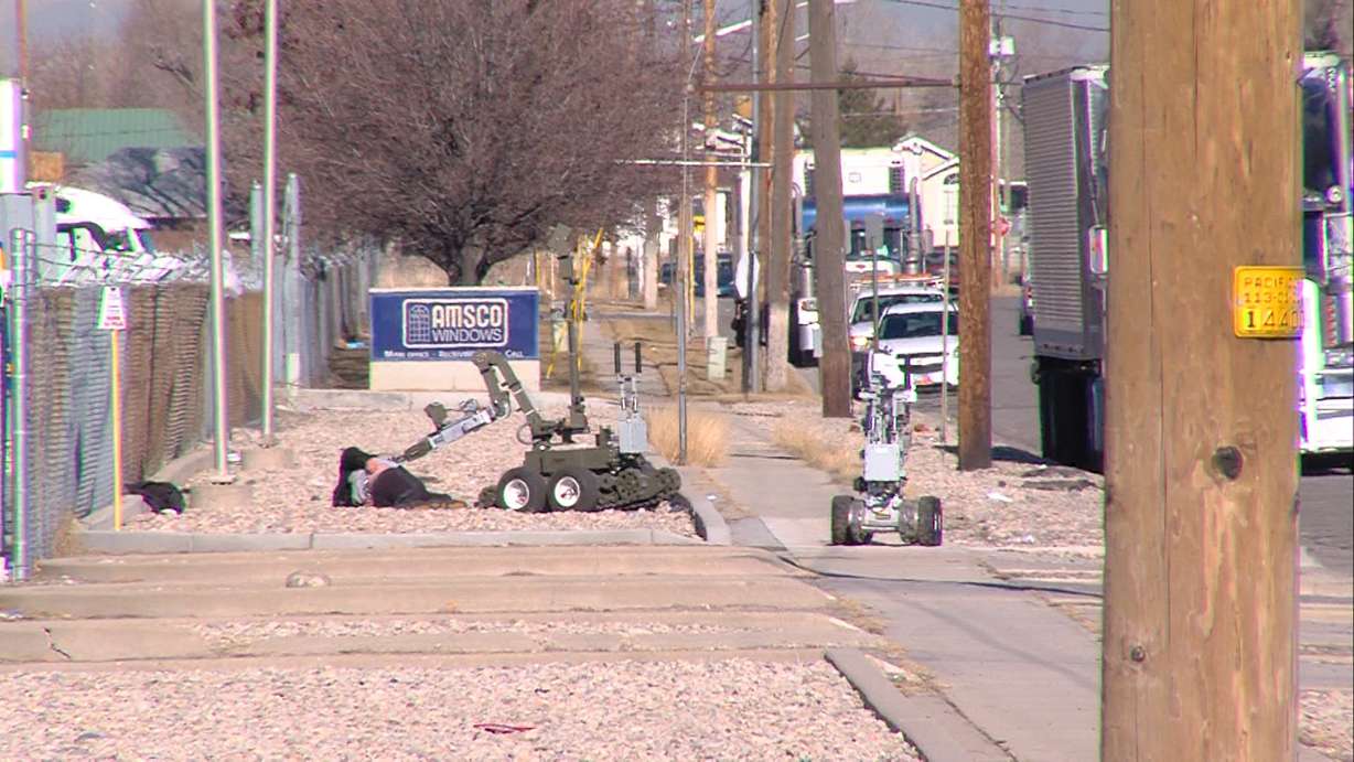 For more than three hours, Salt Lake police blocked off an area surrounding a man who was wearing what officers said appeared to be some kind of explosives vest. Joshua Anthony Silva, 24, was arrested after a bomb squad robot removed the vest from him. (Photo: Derek Petersen/KSL TV)
