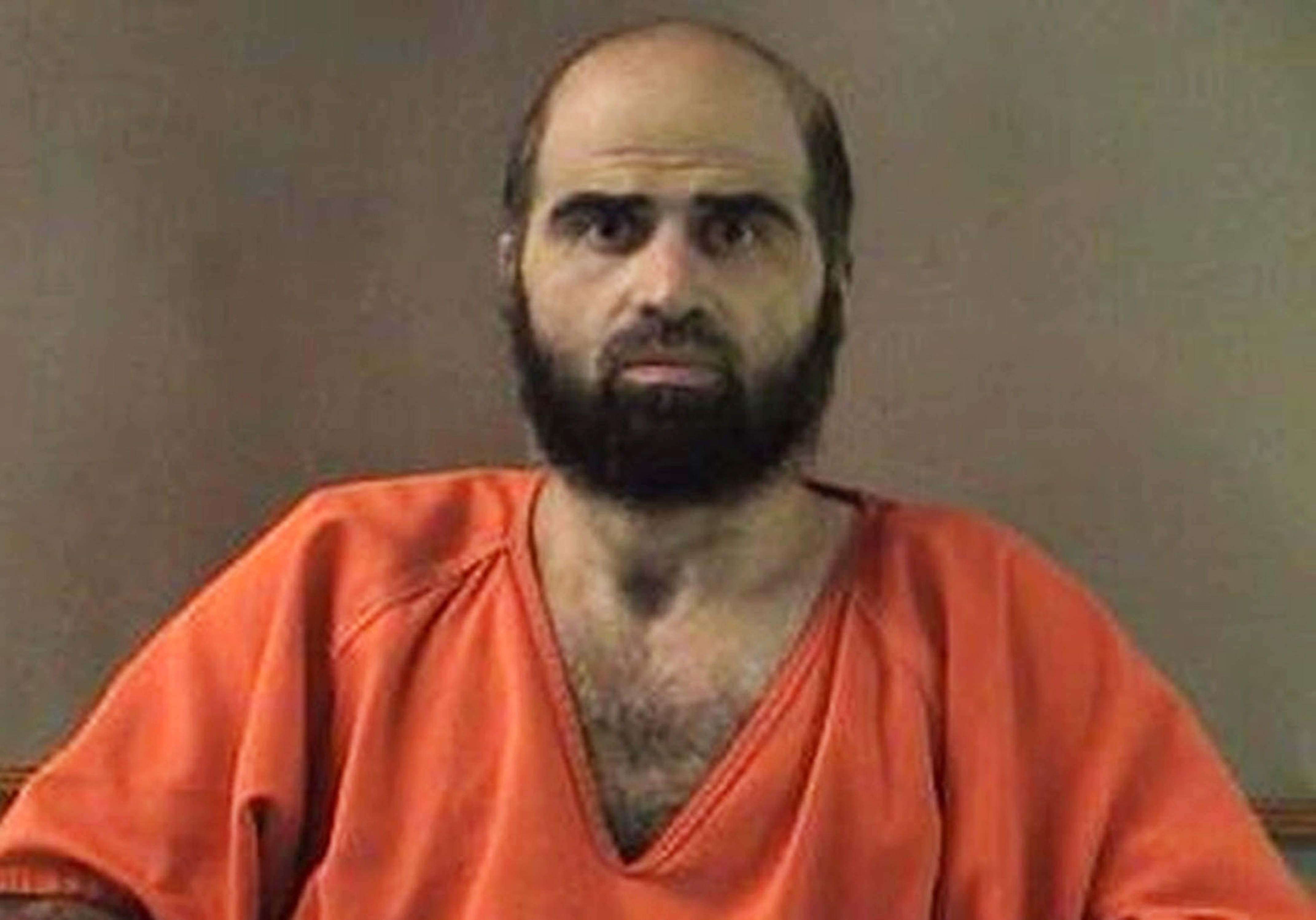 Forcibly shaven, Fort Hood gunman wants to keep top lawyer