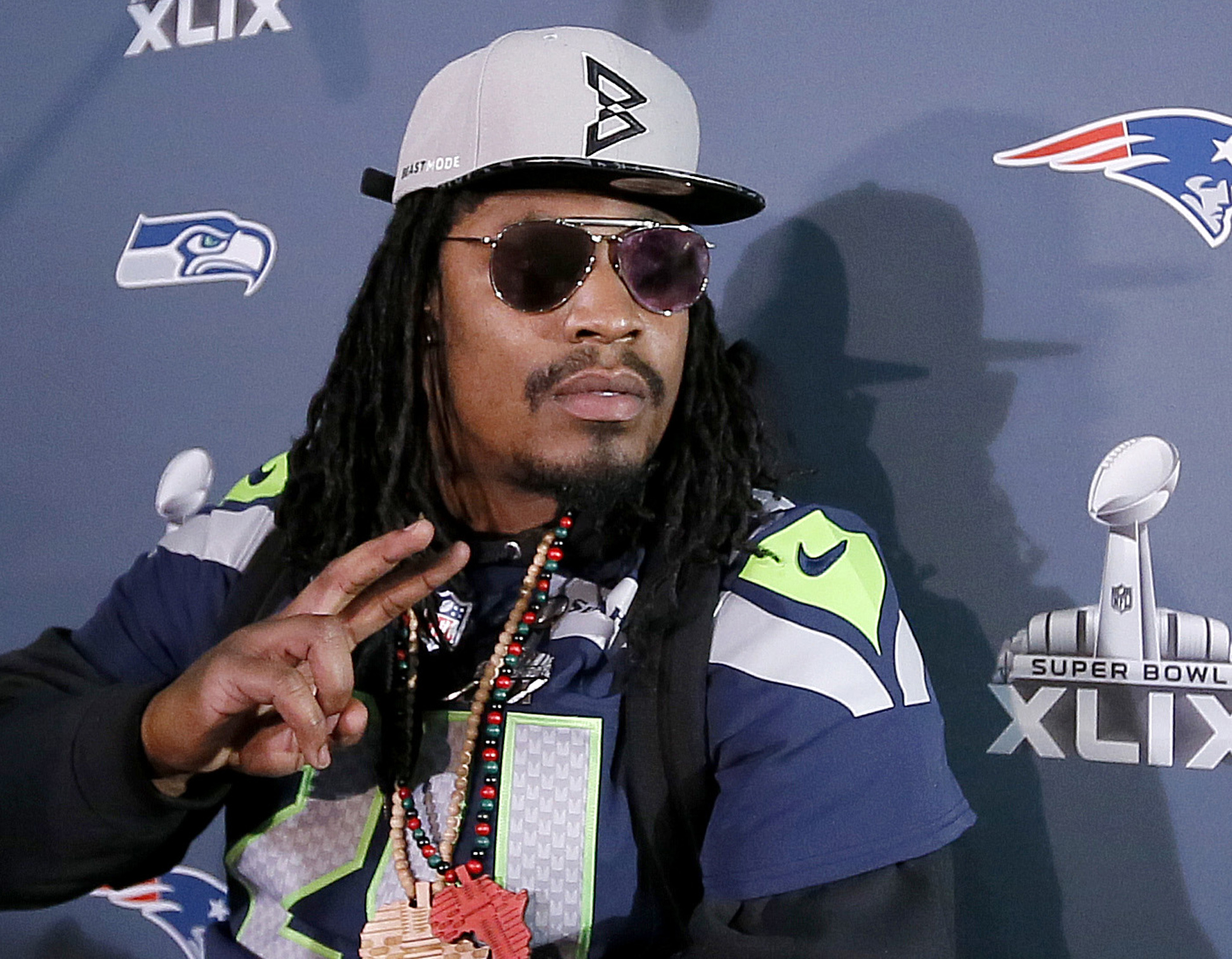 Fans snap up caps designed and worn by Seahawks' Lynch