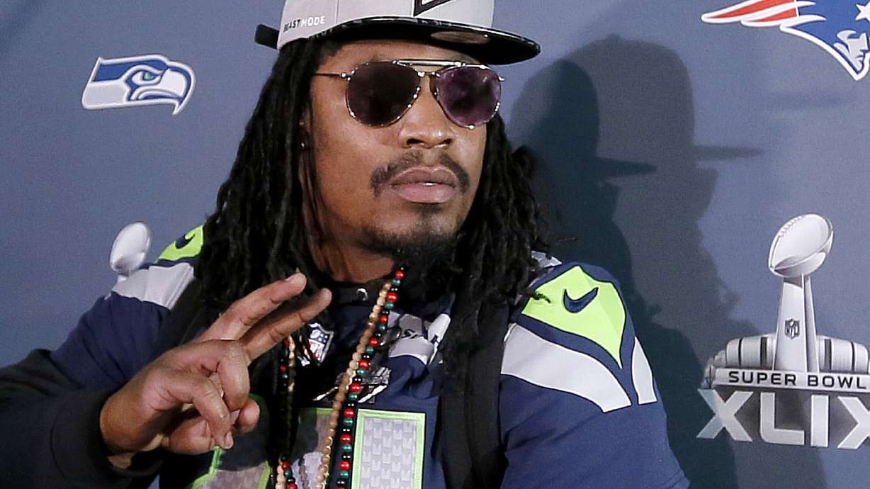 Fans snap up caps designed and worn by Seahawks' Lynch