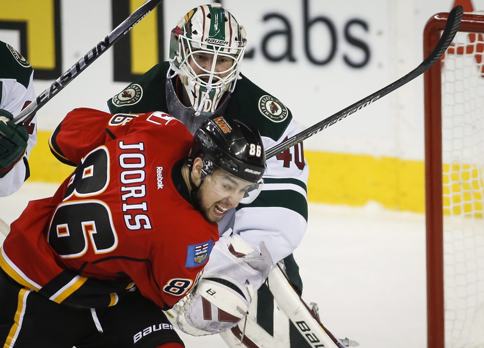 Dubnyk helps Wild blank Flames 1-0