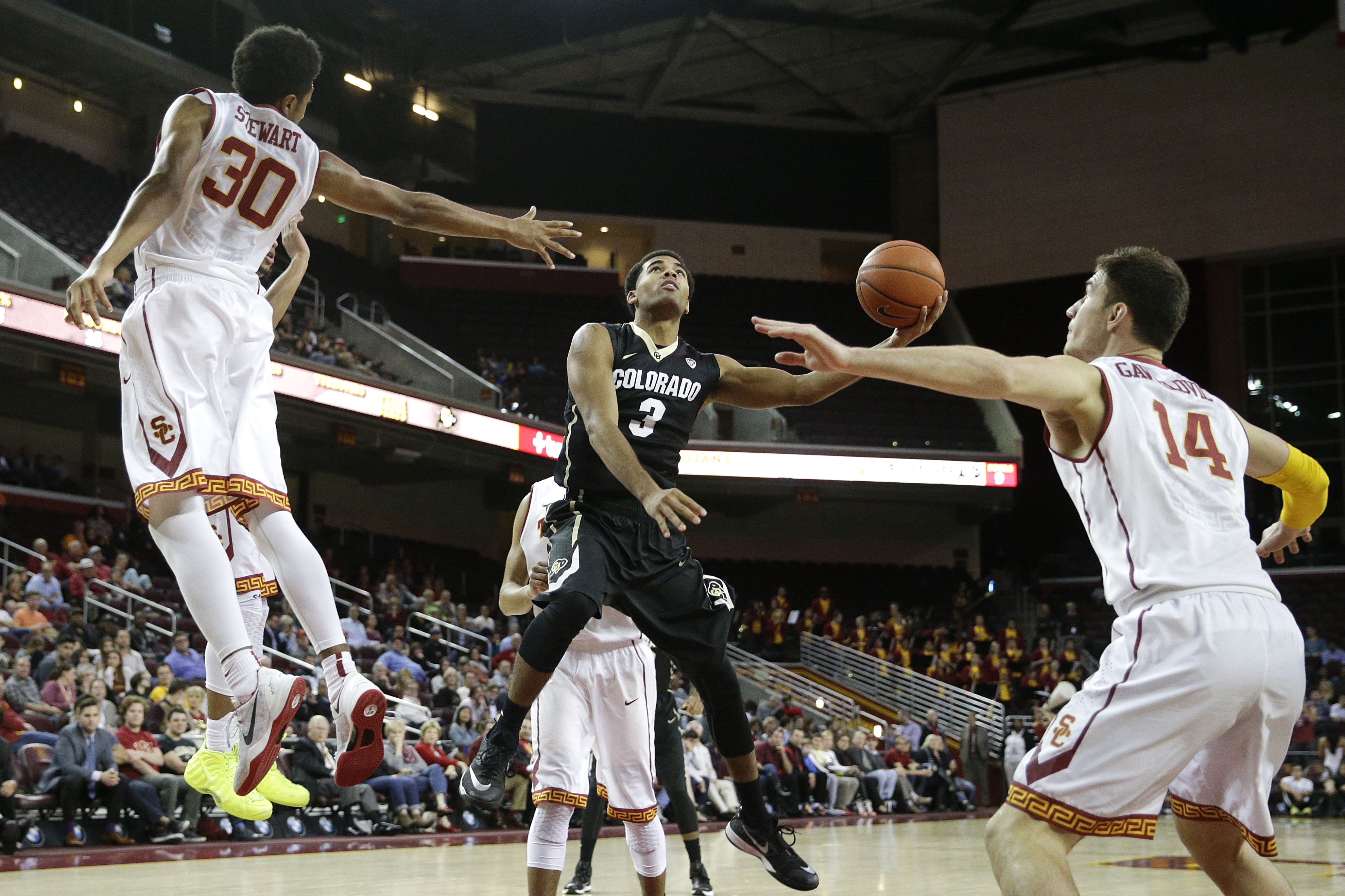 Booker, Colorado outduel USC 98-94 in triple overtime