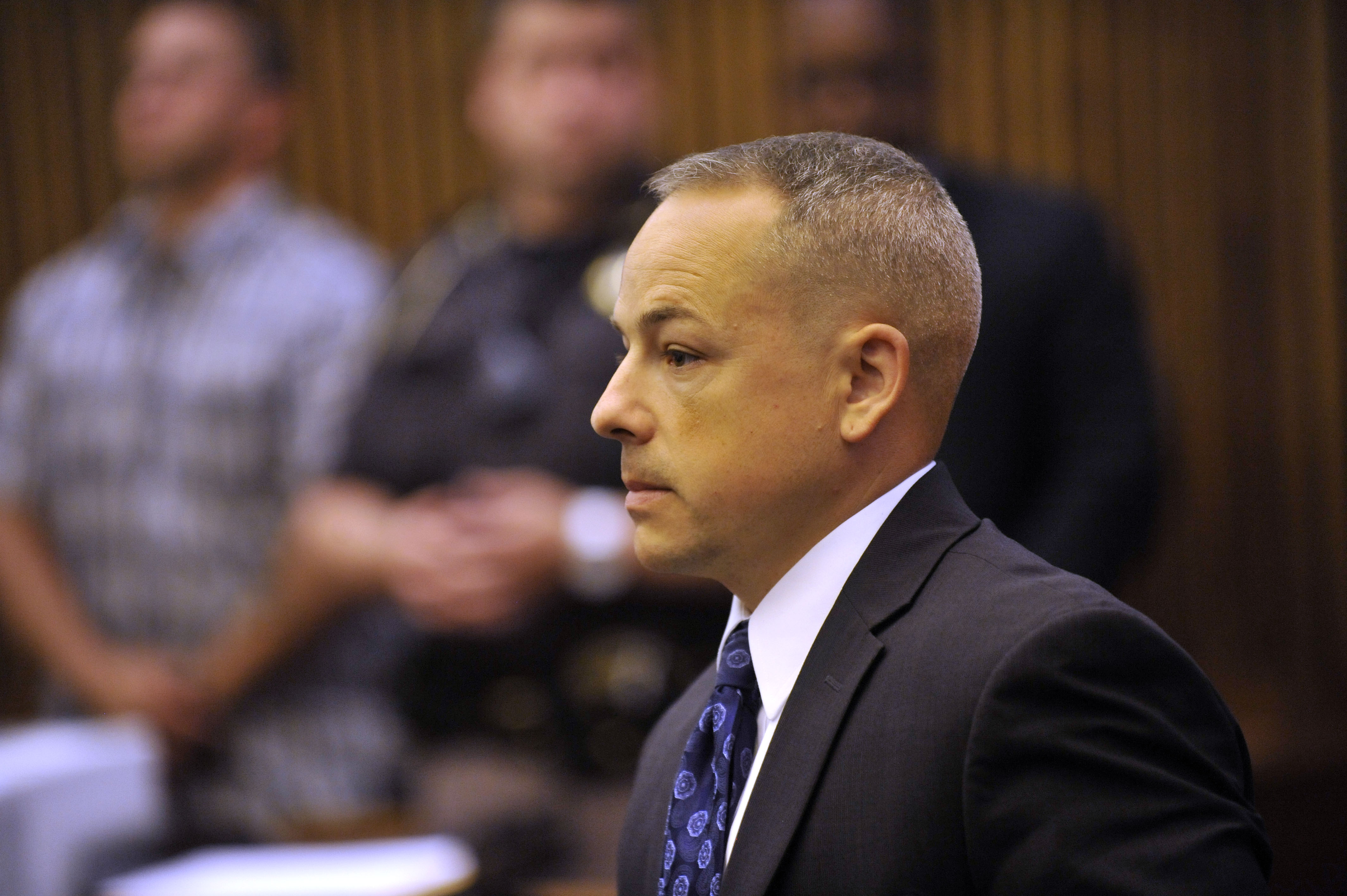 Final charge dropped against Detroit cop in fatal raid