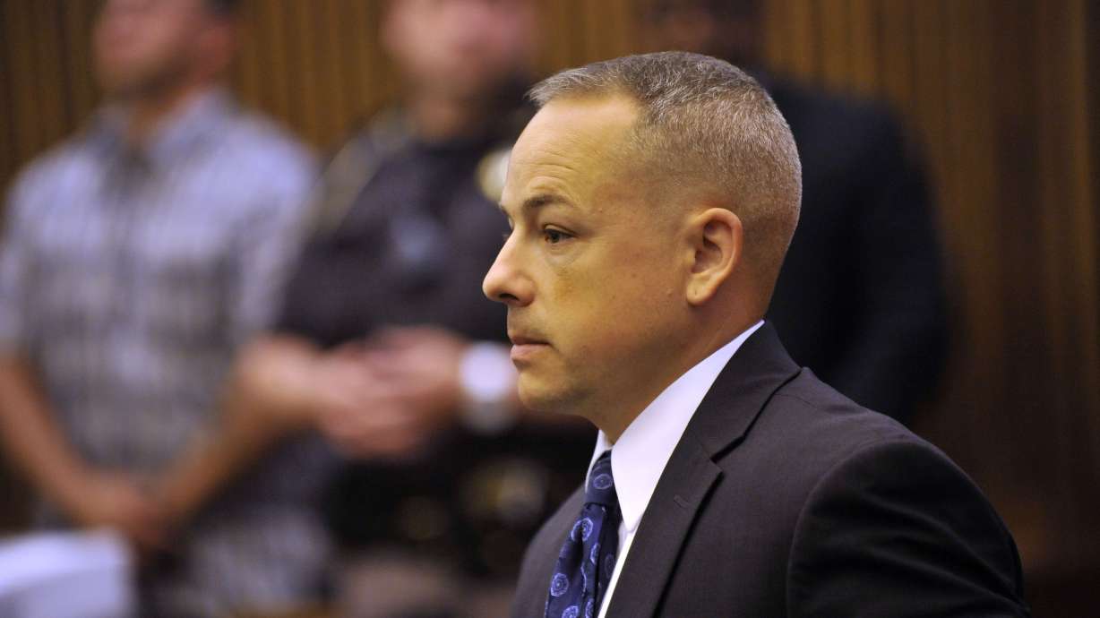 Final charge dropped against Detroit cop in fatal raid