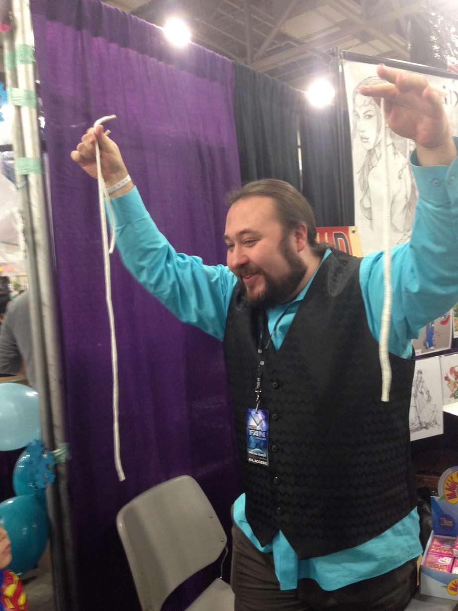 Paul Draper performs magic tricks for kids at Salt Lake Comic Con. (Photo: Sara Jarman)