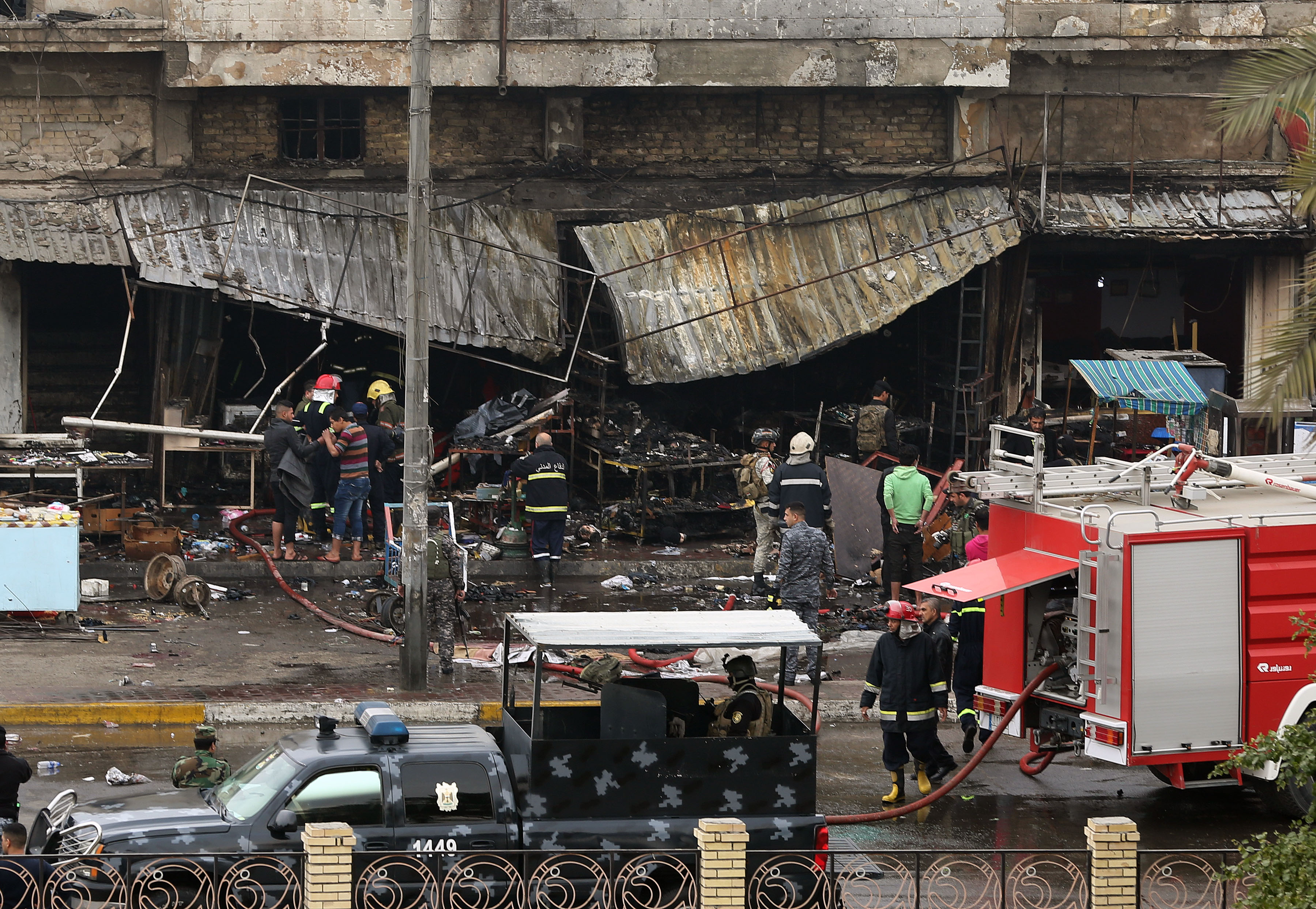 Officials say bombings kill 9 people around Iraq's capital