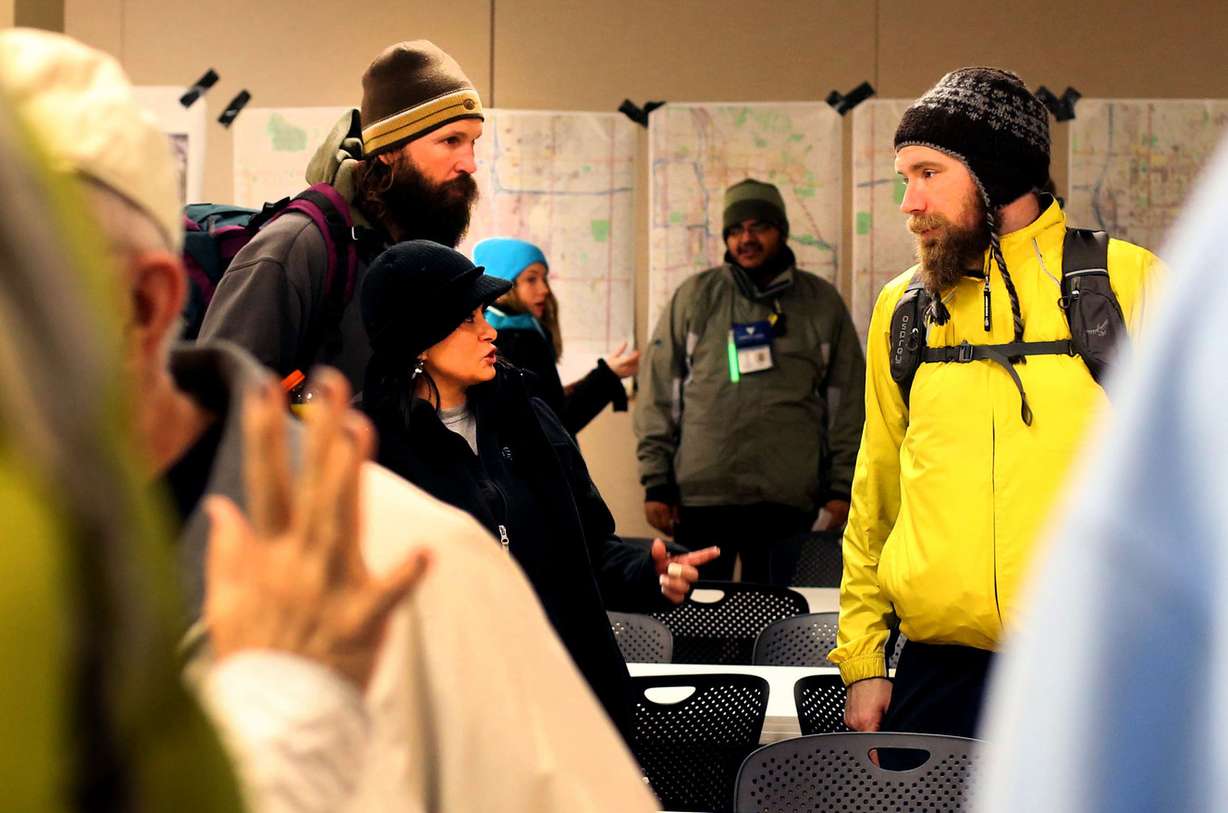 Volunteers gather at Sunrise Metro Apartments before the annual Point In Time Count of unsheltered homeless people in Salt Lake City