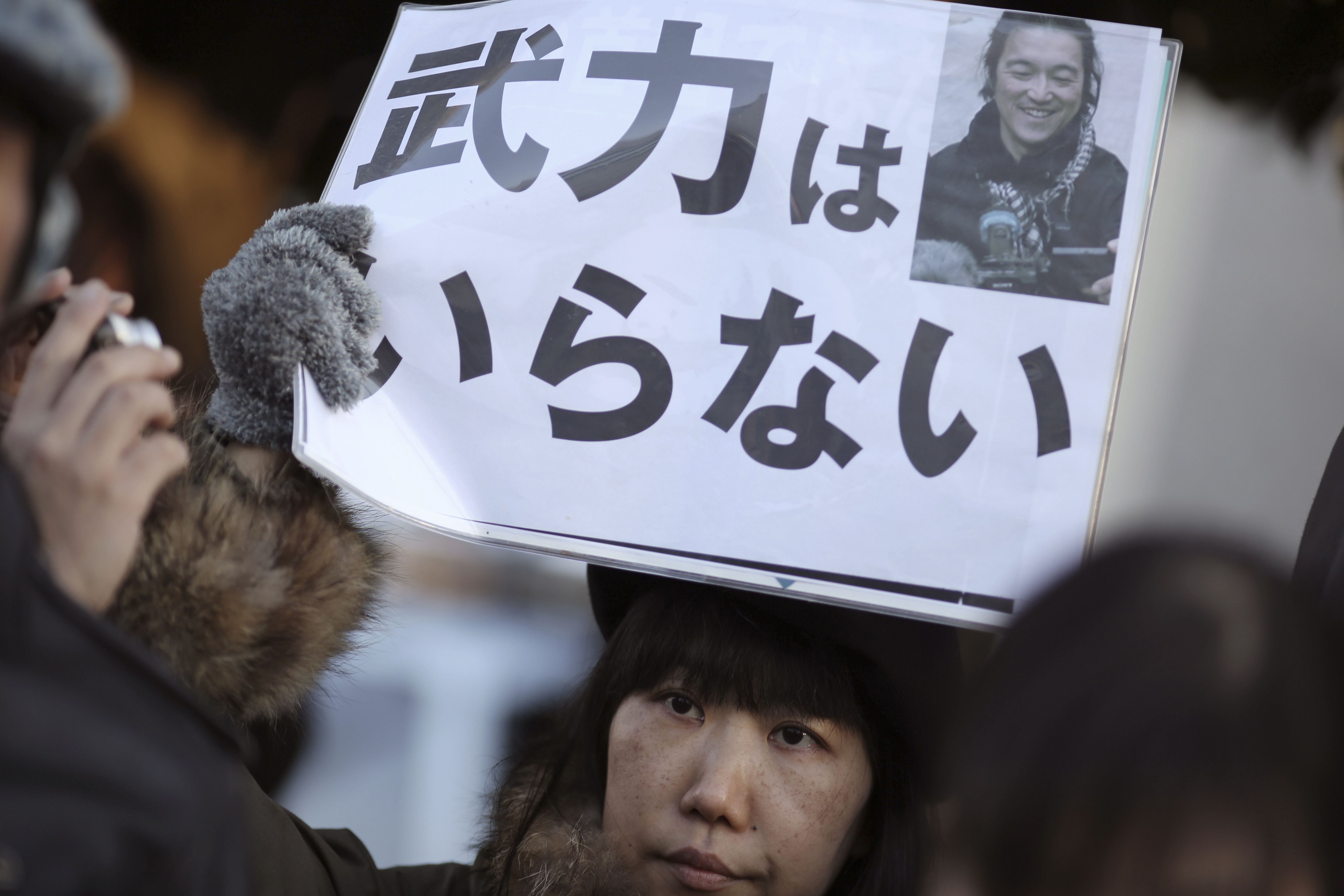 Japan's leader defends handling of hostage crisis