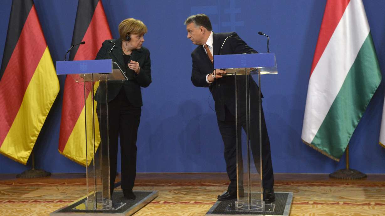 Merkel: Germany won't give weapons to Ukraine, favors talks
