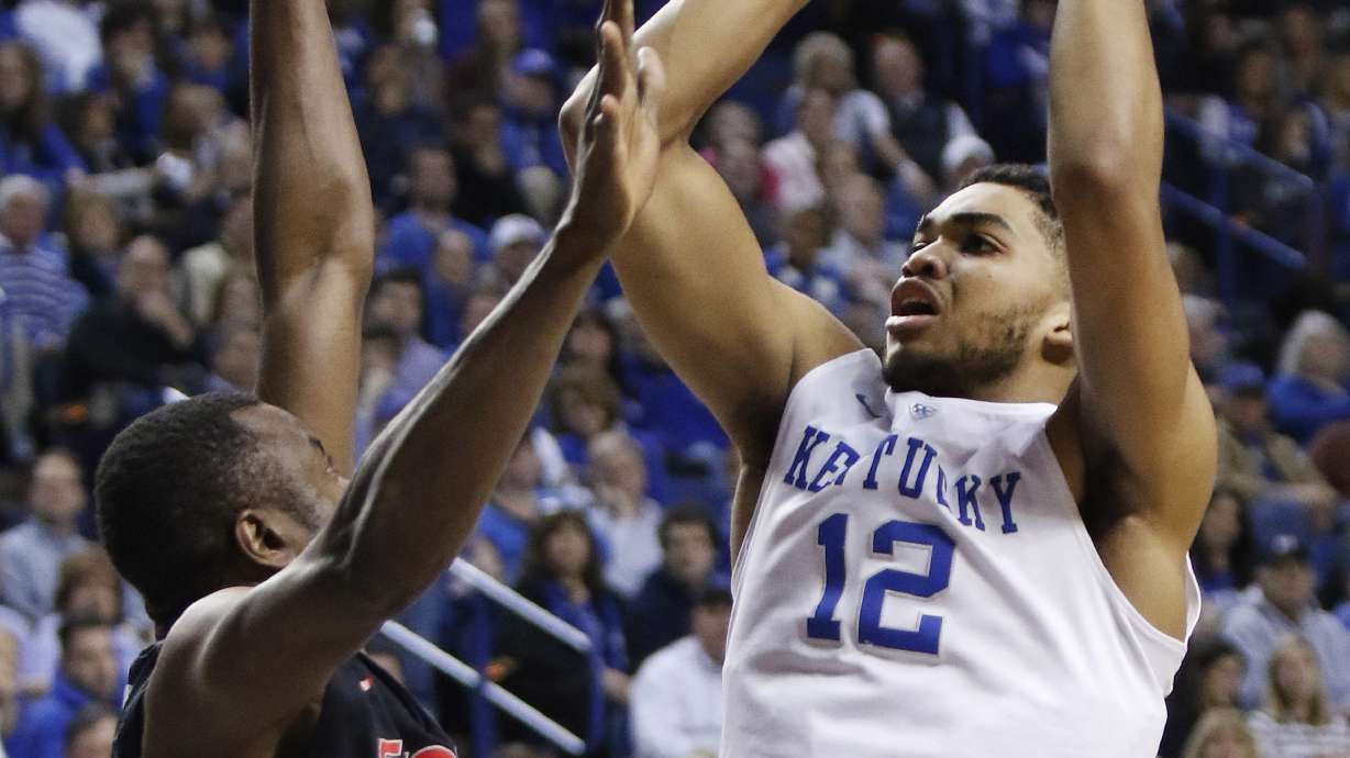 Andrew Harrison scores 23, No. 1 Kentucky turns back Georgia