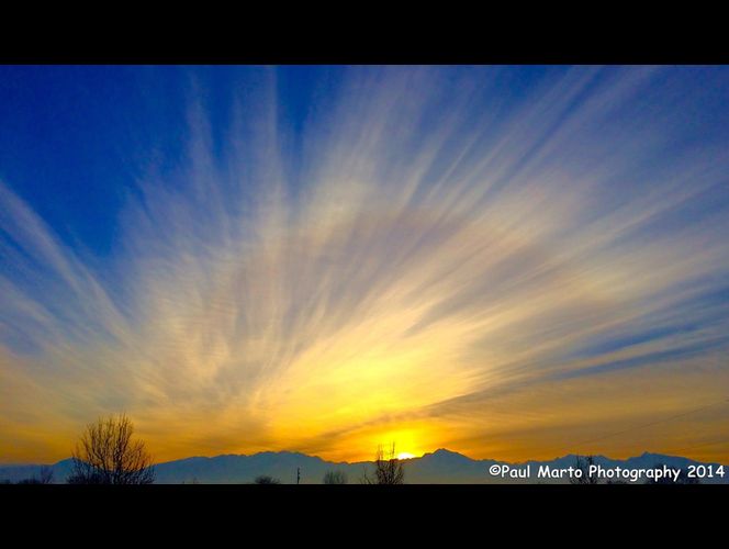 Fotógrafo de West Jordan gana reconocimiento por fotos de nubes arco iris y otra increíbles imagines 
