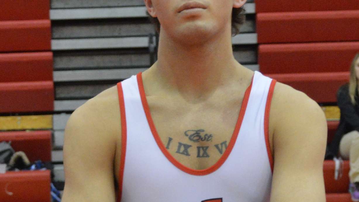 Holland High wrestler thrives after near-death experience