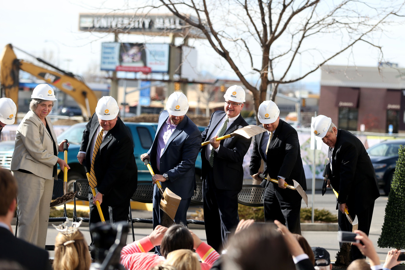 Dirt is shoveled at the groundbreaking ceremony for University Place in Orem on Thursday, Feb. 5, 2015.