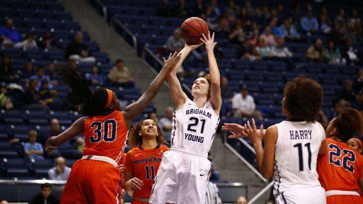 Lexi Eaton takes a shot over the Pepperdine defense during BYU's 77-58 win over the Waves in head coach Jeff Judkins' 300th win of his tenure. (Photo: Jaren Wilkey/BYU Photo)