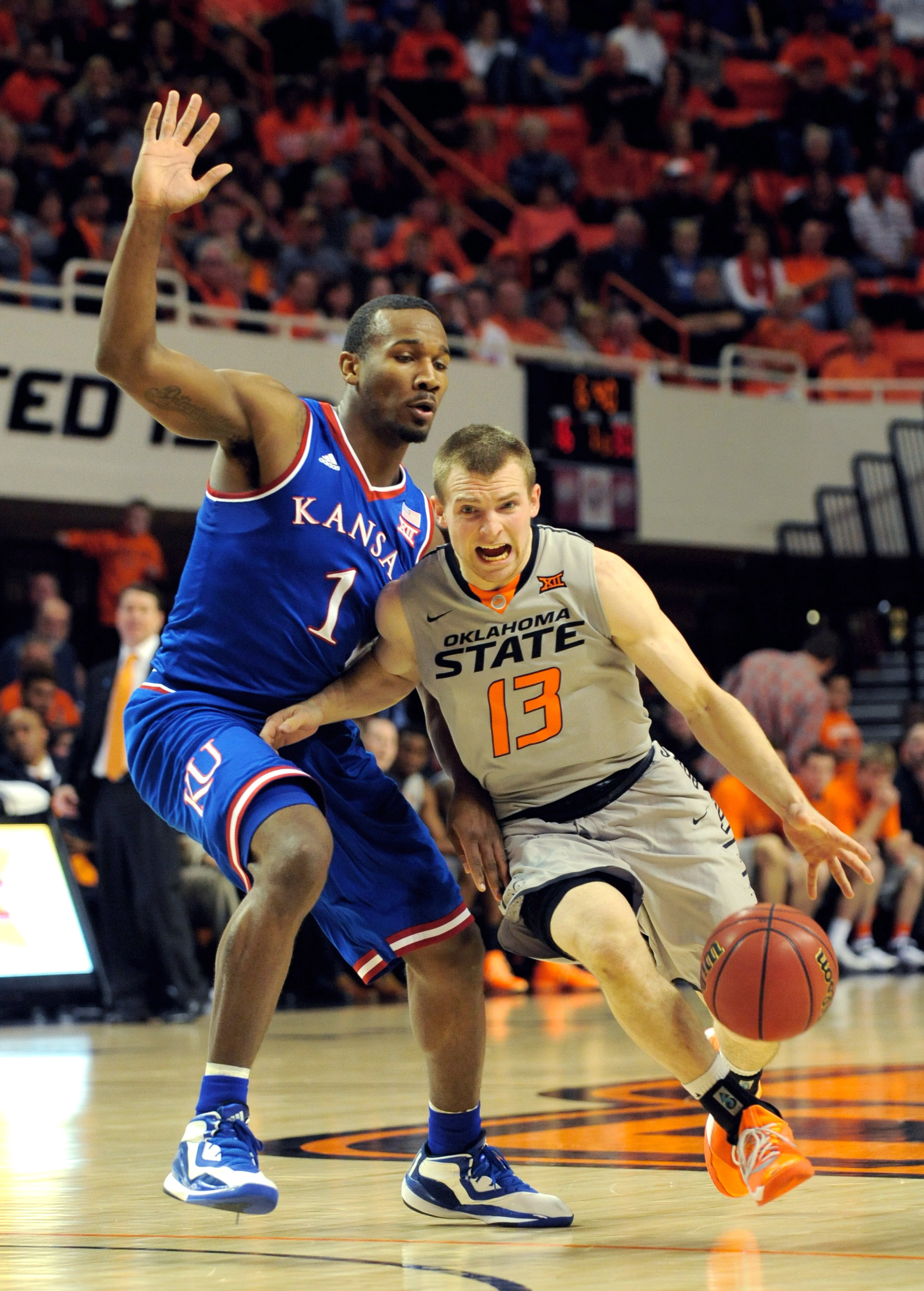 Oklahoma State stuns No. 8 Kansas 67-62