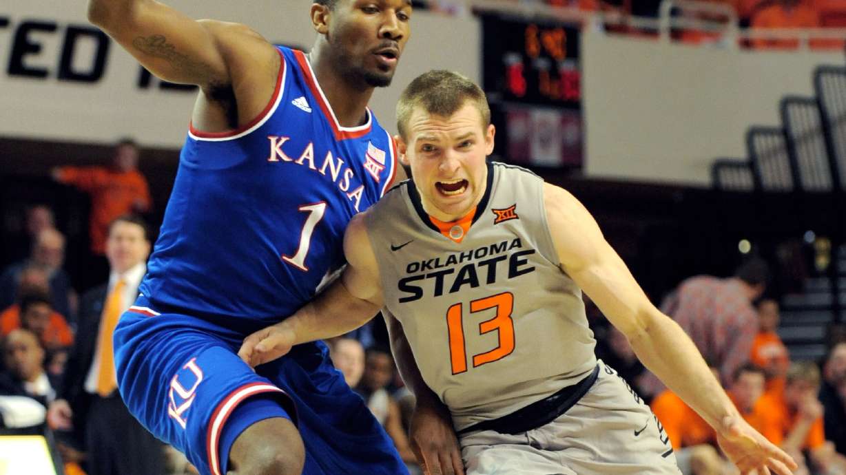 Oklahoma State stuns No. 8 Kansas 67-62