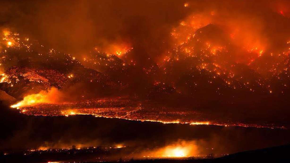 Evacuations remain after wildfire chars California towns