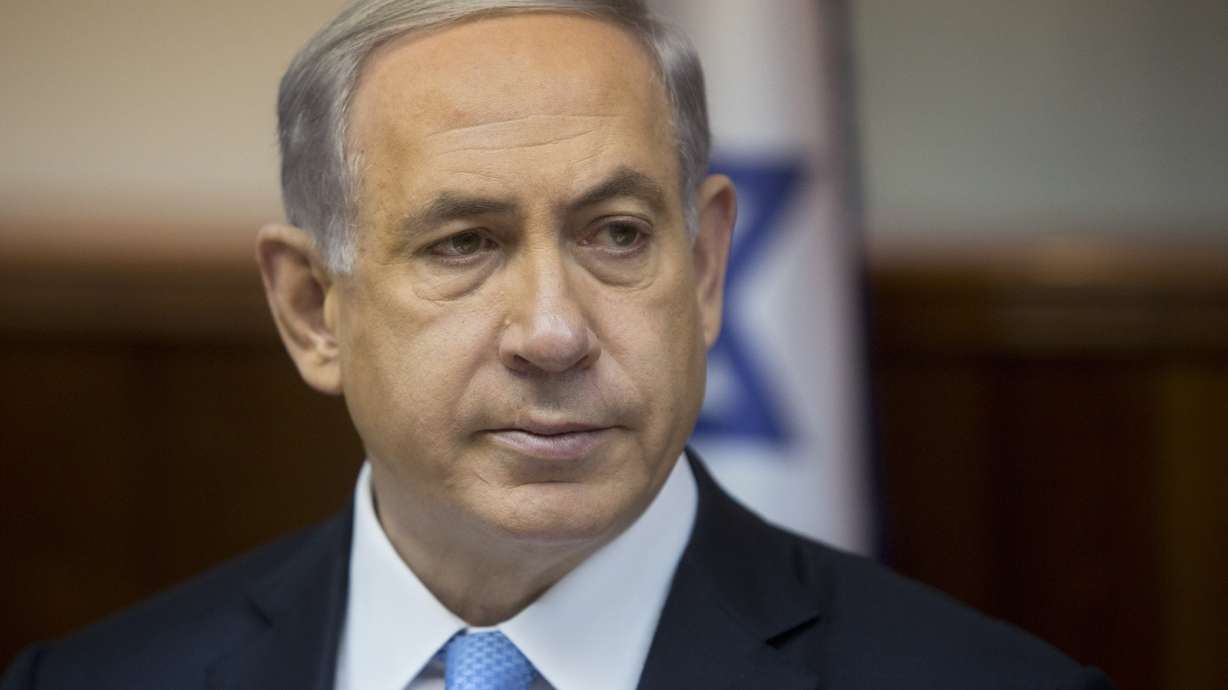 Israel's Netanyahu accuses publisher of smear campaign