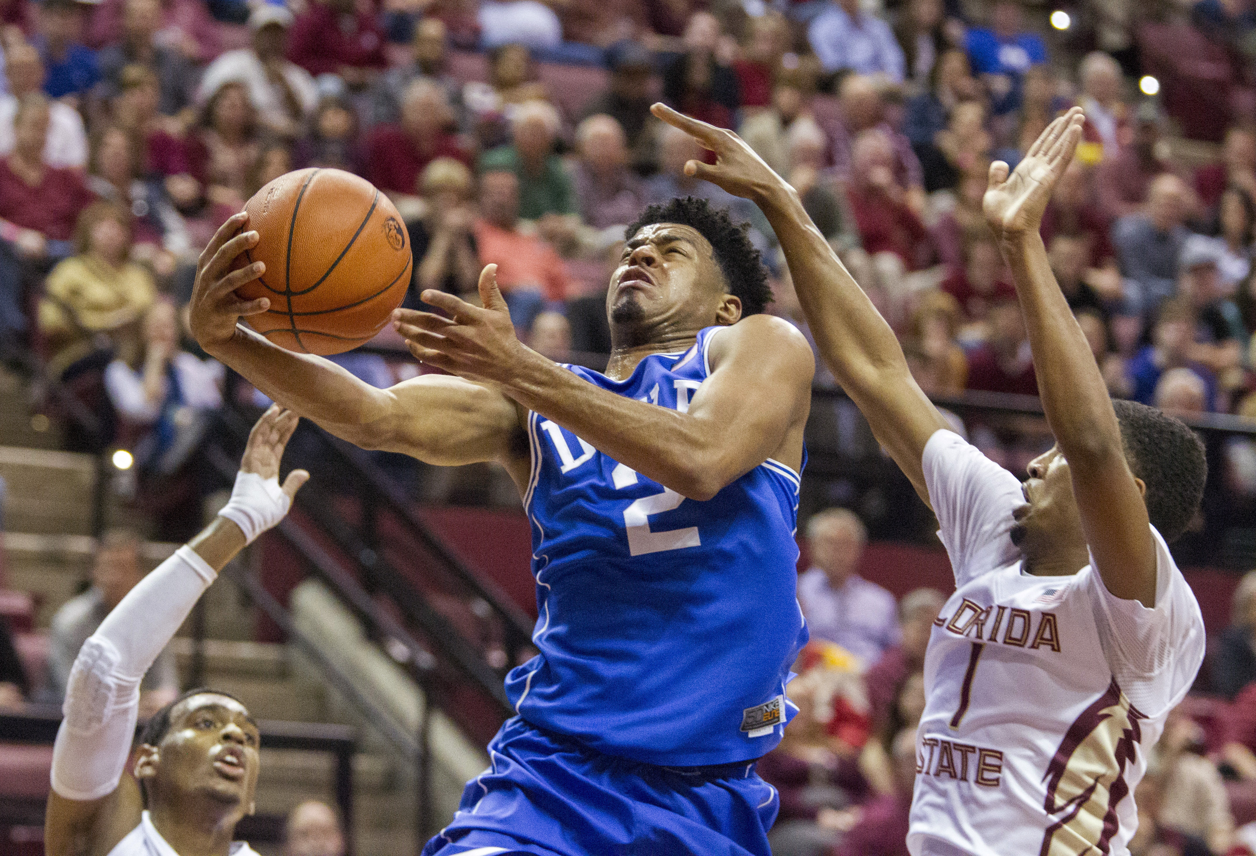 Cook helps No. 4 Duke hold off Florida State 73-70