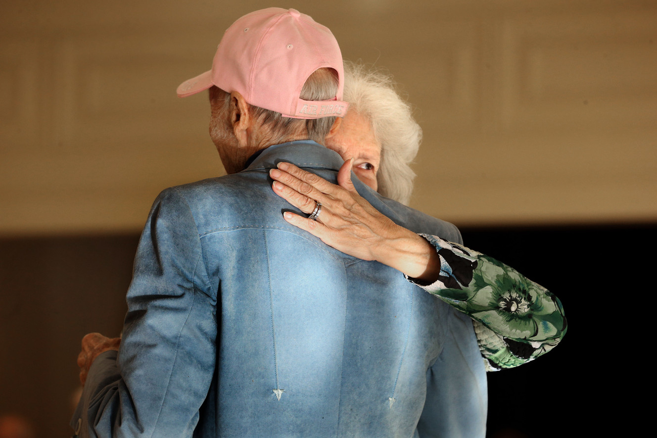 Lou Fisher peeks over her boyfriend's shoulder while dancing at the Tenth East Senior Center in Salt Lake City on Wednesday, Feb. 4, 2015. (Photo: Laura Seitz, Deseret News)