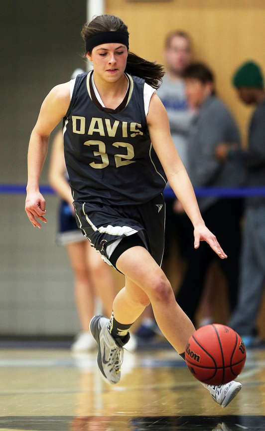 Hannah Snell brings the ball up the court for Davis during a 44-36 win over Hunter in the Class 5A girls basketball state tournament Monday at Salt Lake Community College. (Ravell Call/Deseret News)