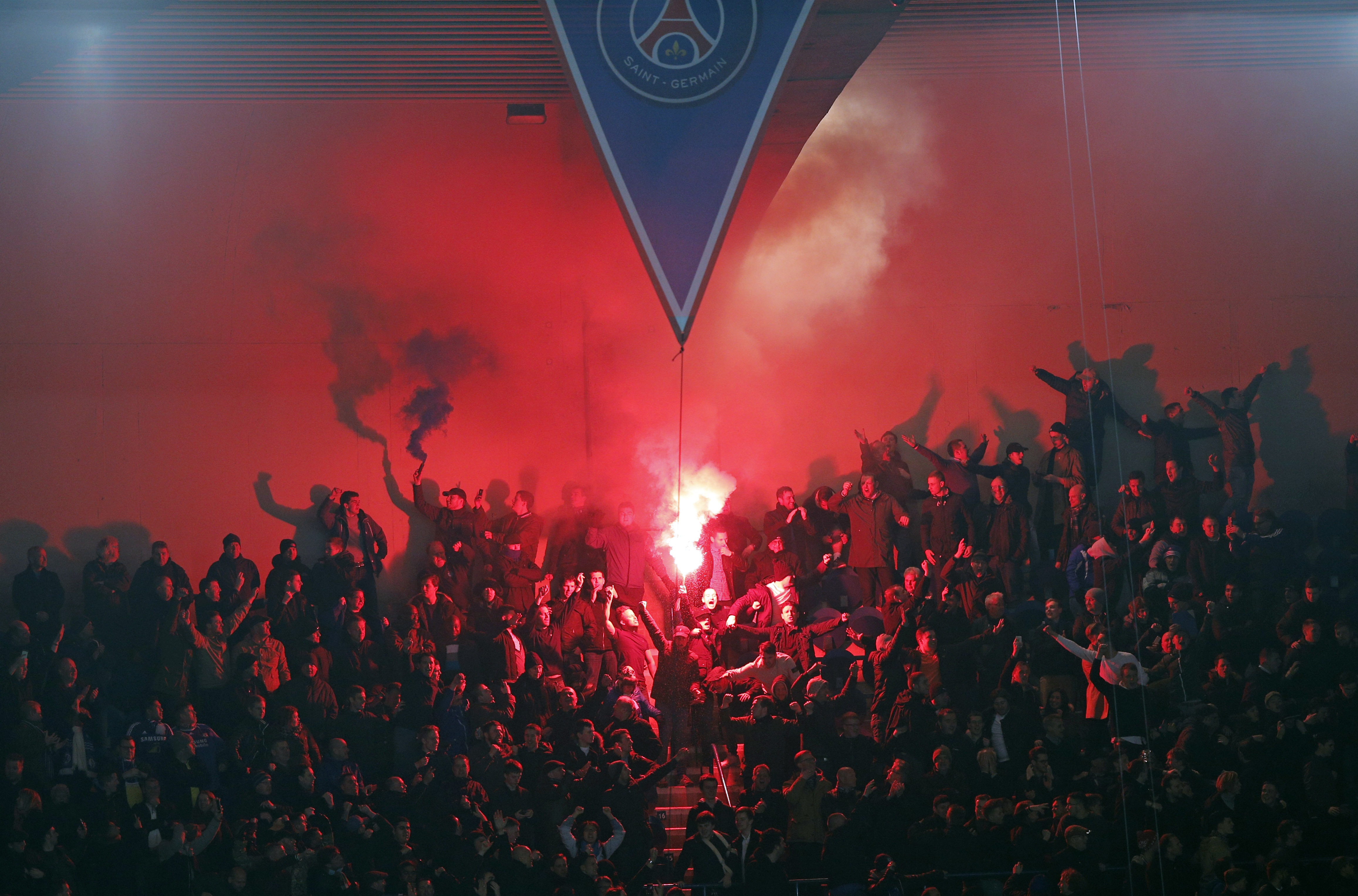 Chelsea fans in Paris prevent black man from boarding train