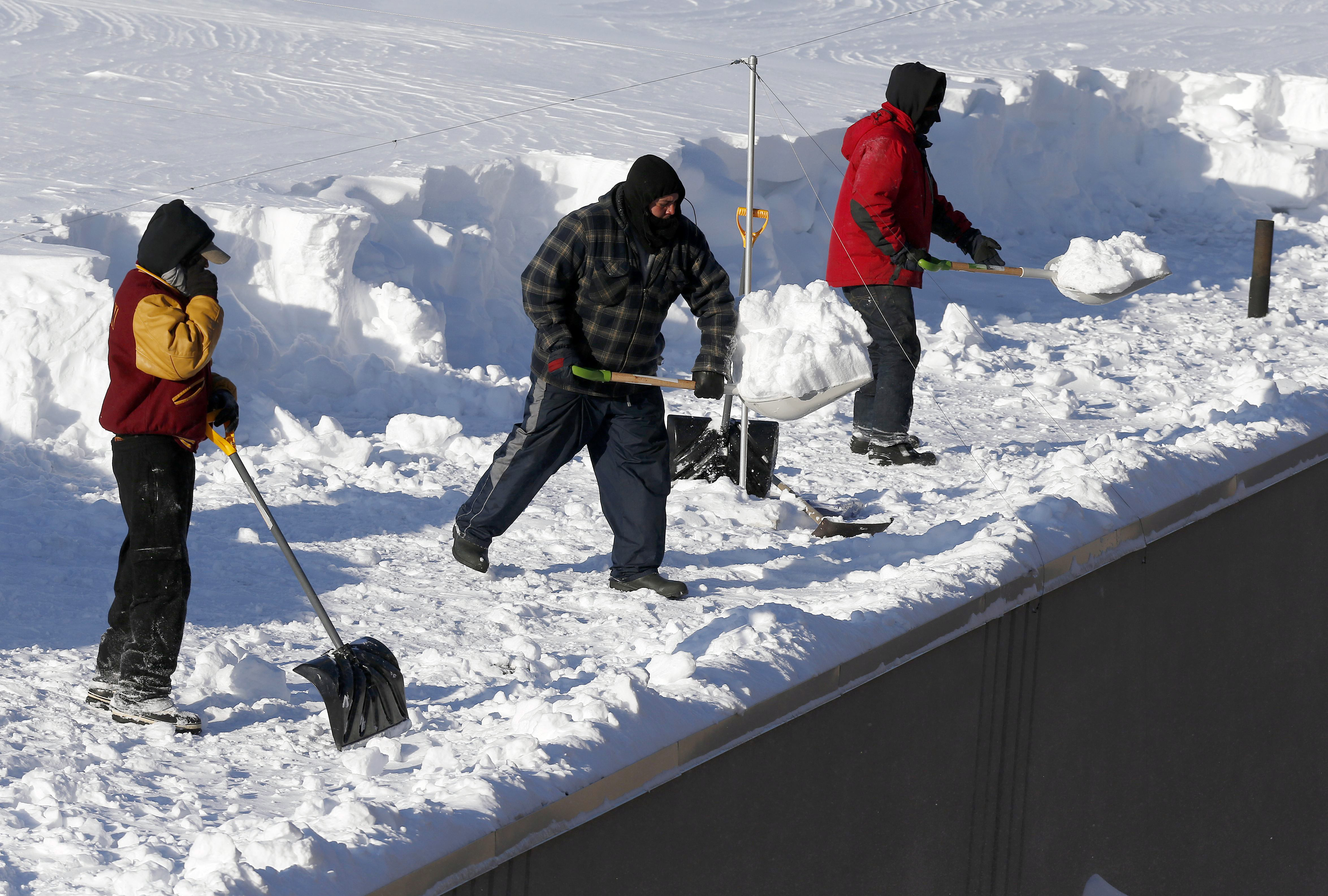 Dozens of New England roofs buckling under 8 feet of snow