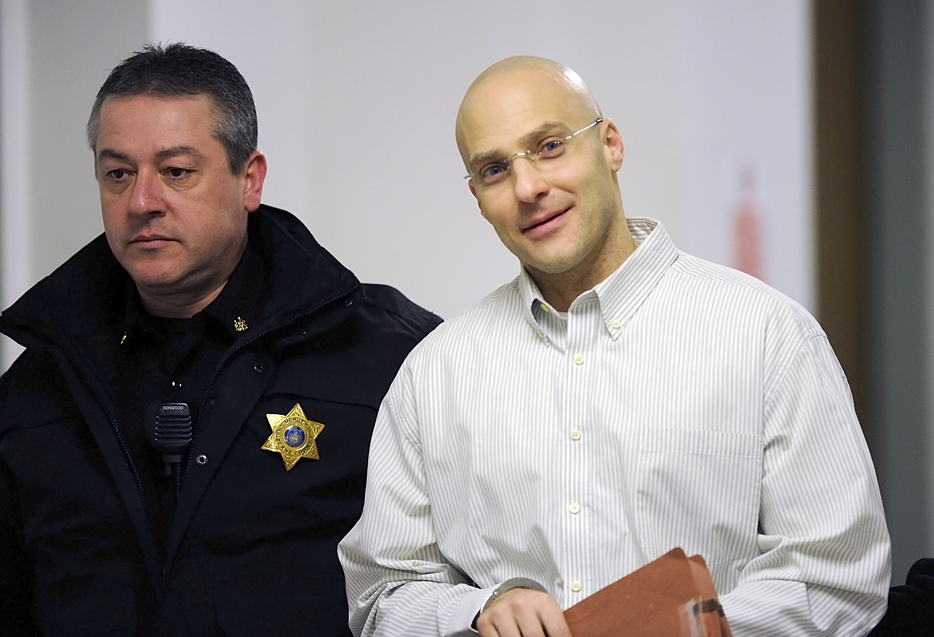 Man with bodies buried in his yard gets life in prison