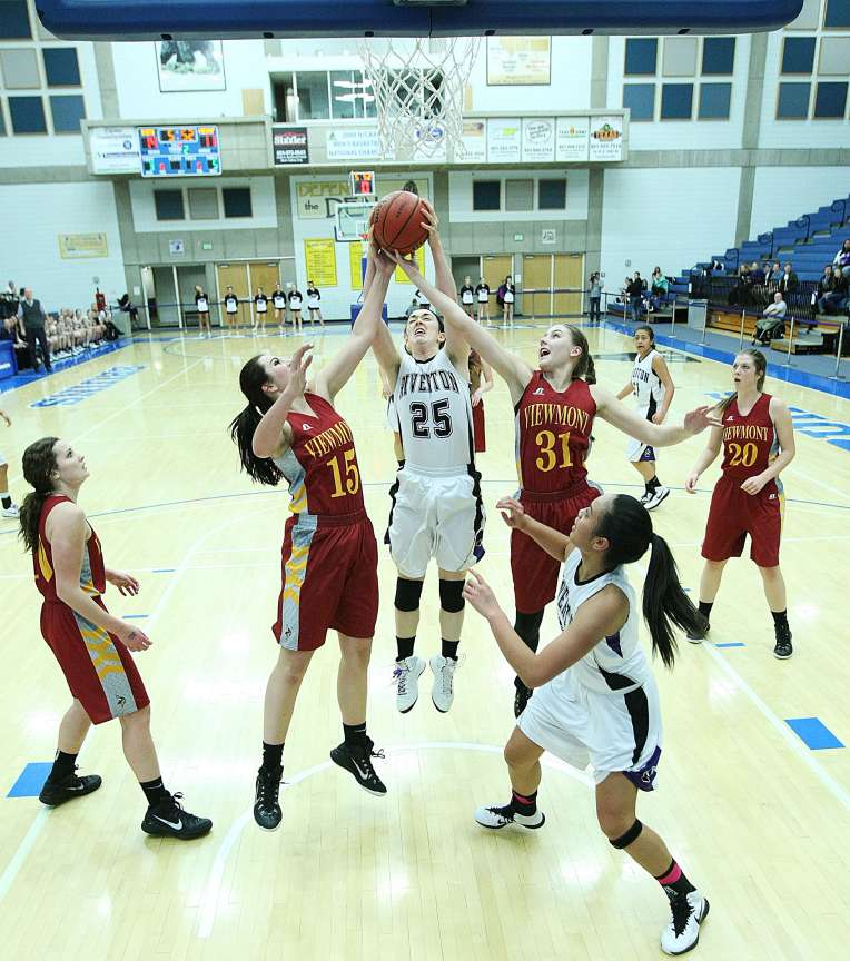 Riverton's Rebecca McDougal battles Viewmont's Alexandra Salimbene and Katie Toole on Wednesday in Class 5A quarterfinal action at Salt Lake Community College. (Scott G Winterton/Deseret News)