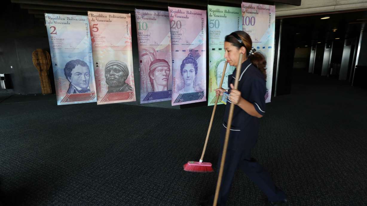 Venezuela allows sale of dollars at near-black market rate