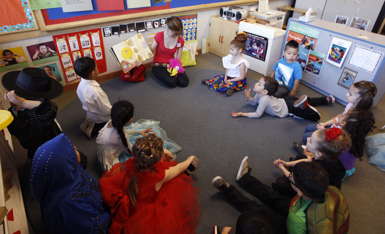 Liesl Johnson, children's services coordinator with Salt Lake City Public Library, reads to students in a pre-K classroom at the James R. Russell Head Start facility in Salt Lake City Thursday, Feb. 19, 2015. (Photo: Chelsey Allder, Deseret News)
