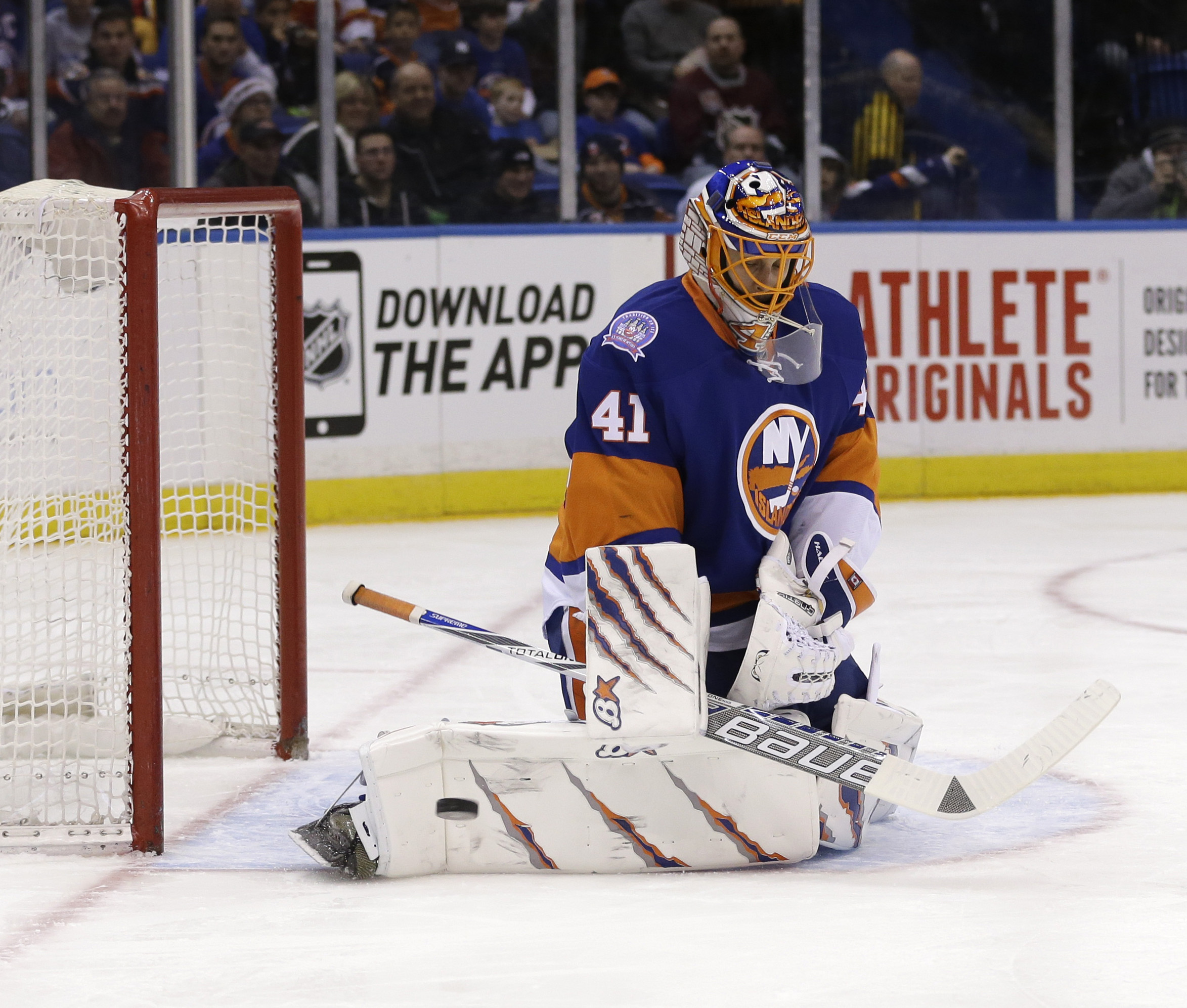 Halak tops Flames to set Islanders' single-season win record