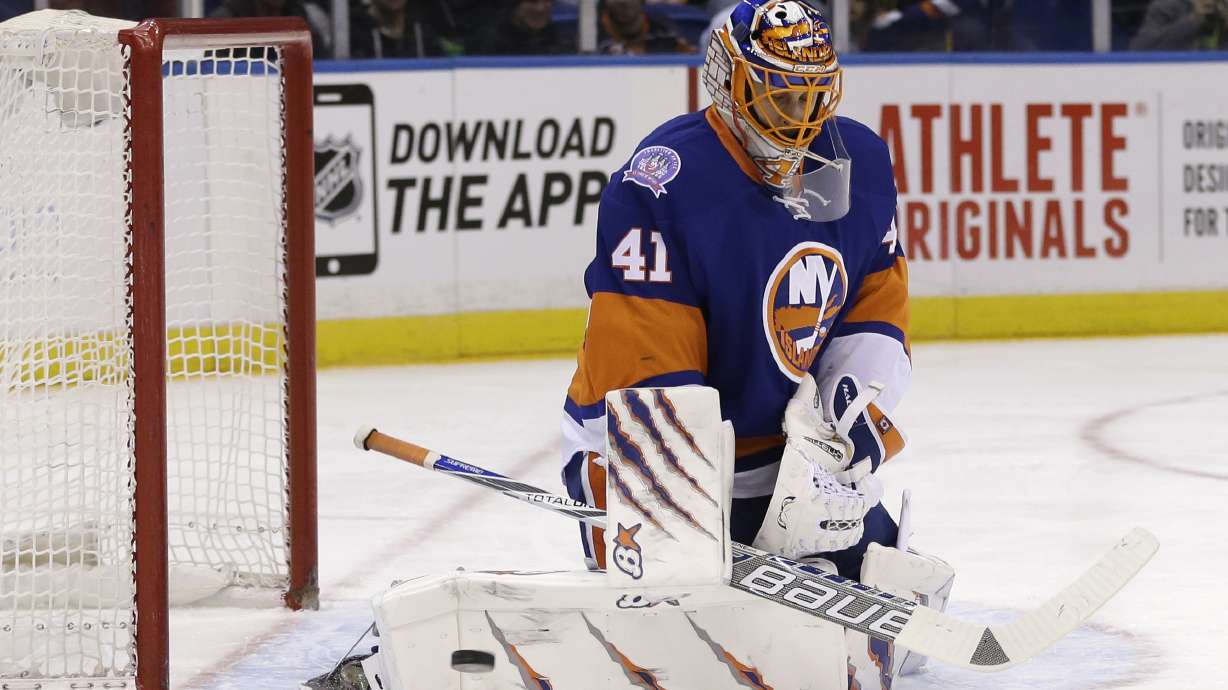 Halak tops Flames to set Islanders' single-season win record