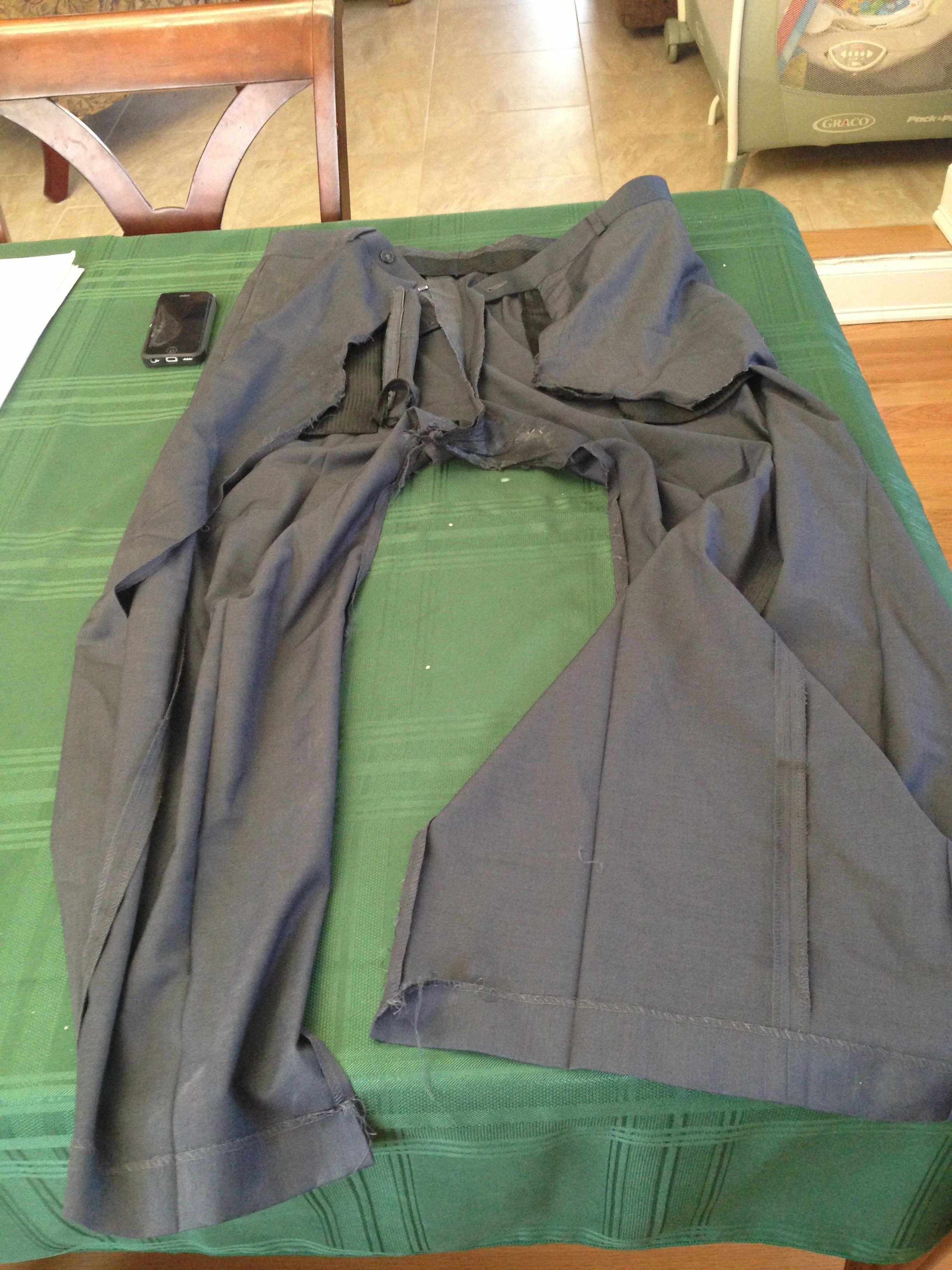 Erik Johnson said his iPhone exploded in his pants, melting the edges of his pocket shut. (Credit: CNN)