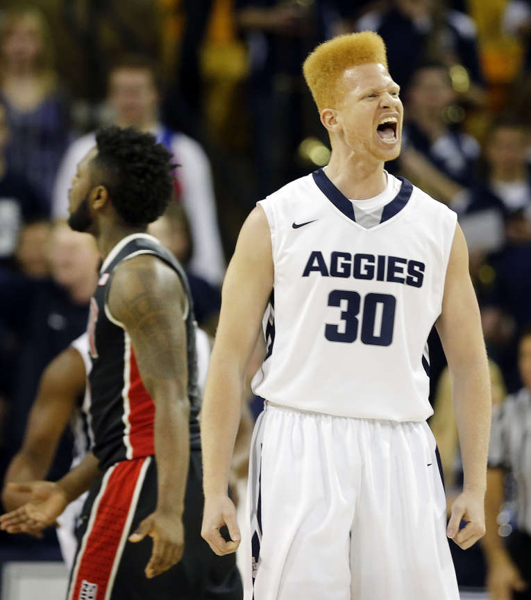 Sean Harris of Utah State celebrates as USU builds a lead over UNLV during an NCAA basketball game in Logan, Tuesday, Feb. 24, 2015. (Ravell Call/Deseret News)