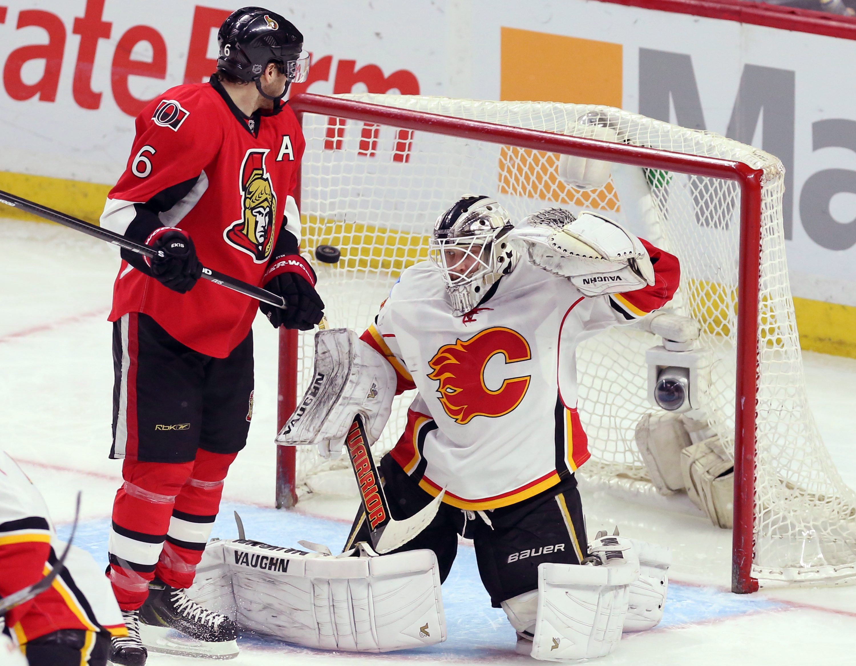 Senators blow big lead, beat Flames 5-4 in shootout