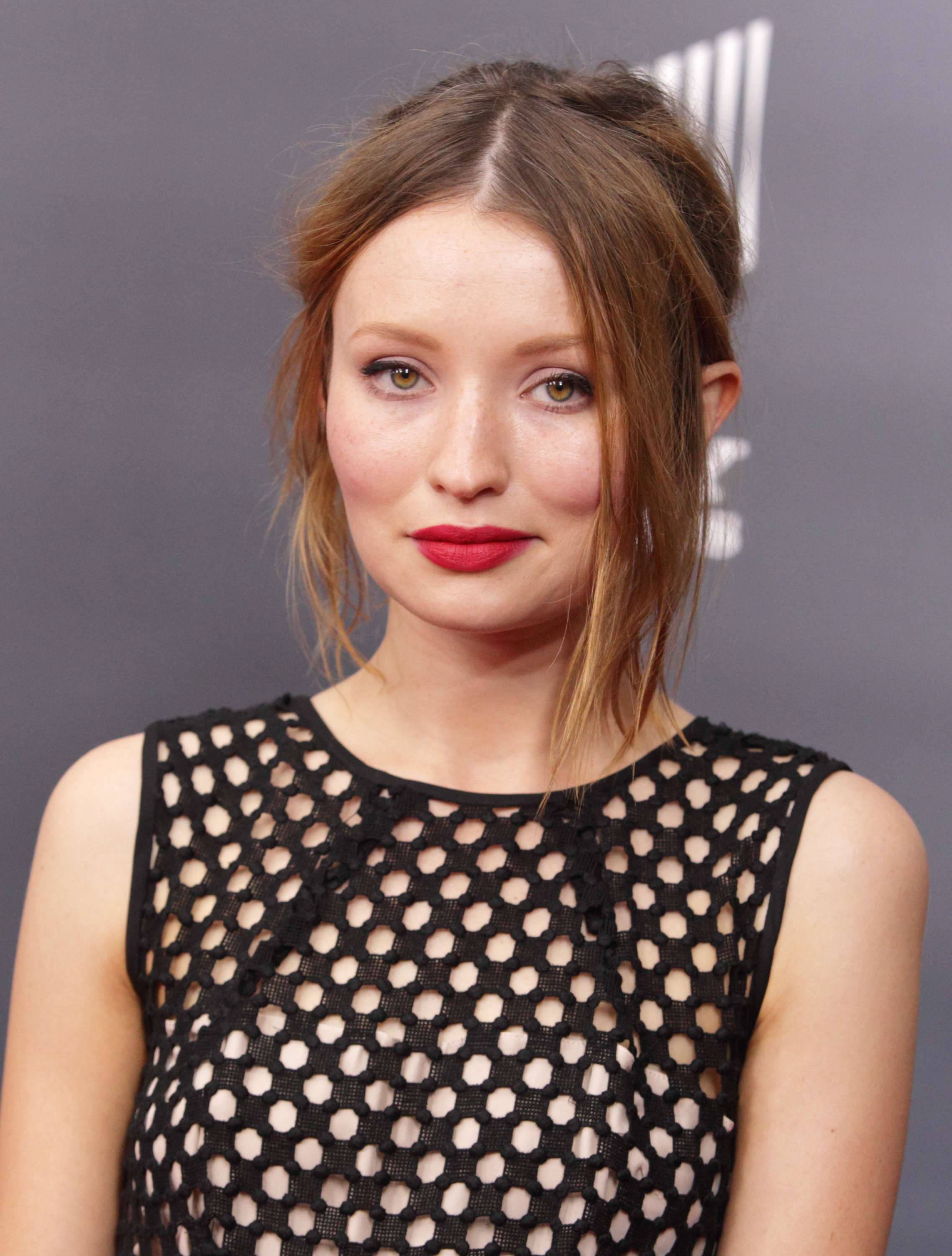 Actress Emily Browning arrives for the world premiere of "Fury" at the Newseum on Wednesday, Oct. 15, 2014, in Washington D.C. (Photo by Owen Sweeney/Invision/AP)