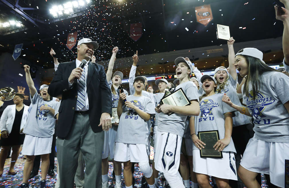 BYU players celebrate their win over the San Francisco Lady Dons during the West Coast Conference Basketball Championship game in Las Vegas March 10, 2015. BYU won 76-65. (Jeffrey D. Allred/Deseret News)
